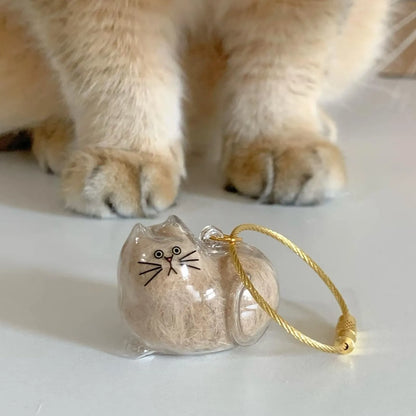 PurrCapsule Katzenhaar-Erinnerungs-Schlüsselanhänger