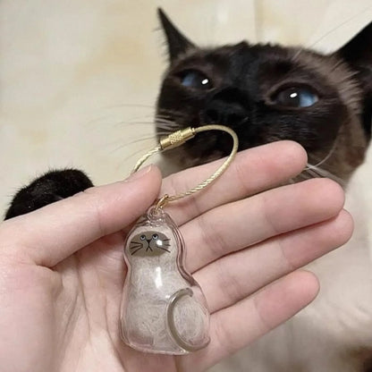 PurrCapsule Katzenhaar-Erinnerungs-Schlüsselanhänger